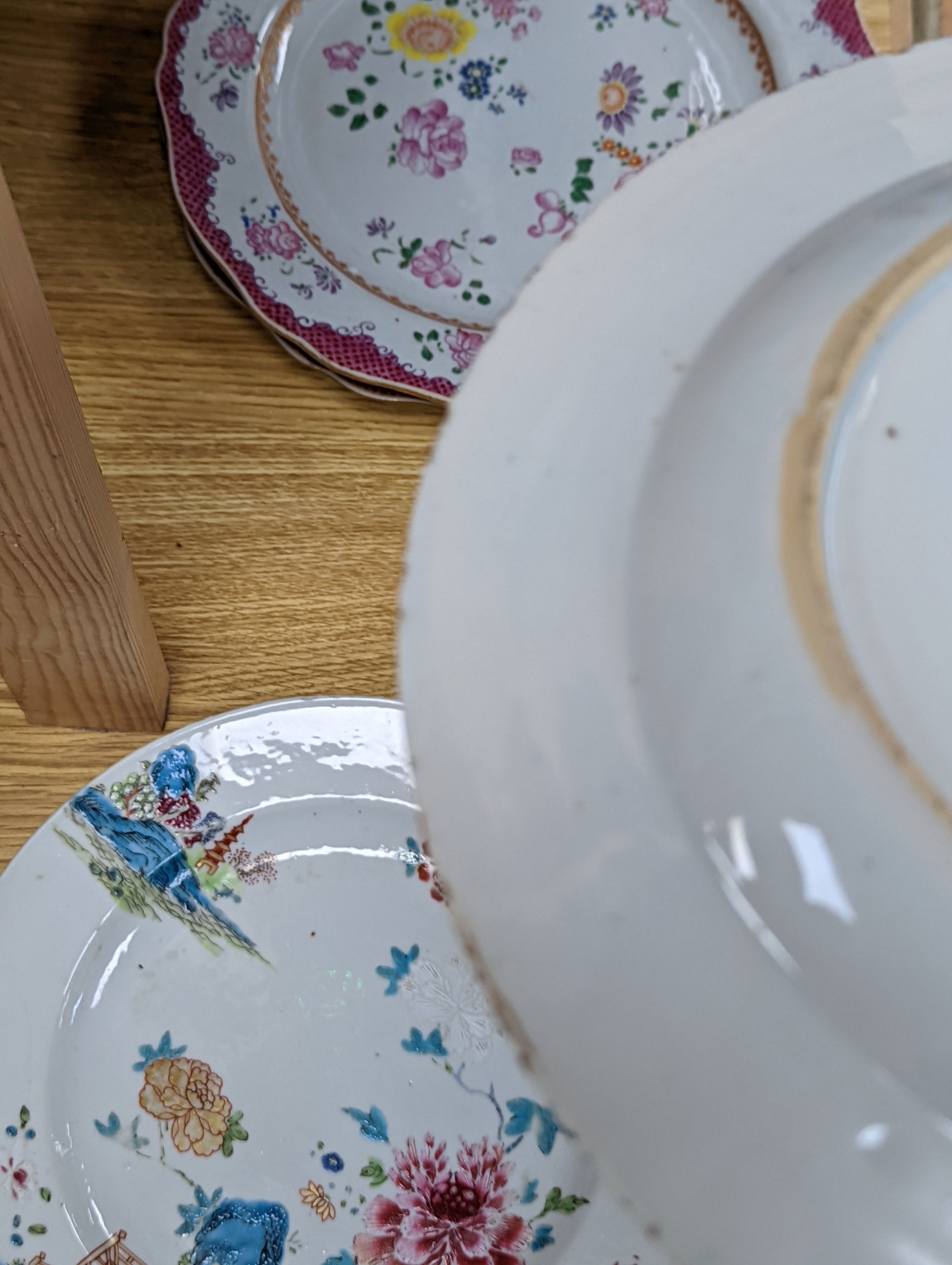 Two pairs of 18th century Chinese famille rose plates and an Imari plate, 26cm